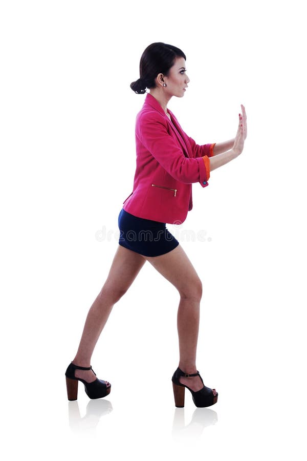 Businesswoma pushing royalty free stock images