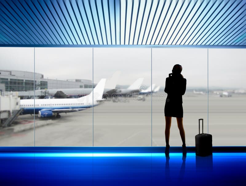 Businesswoman in airport stock photography
