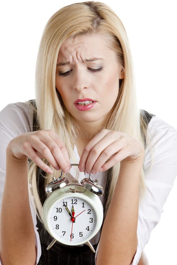 Businesswoman with an alarm clock