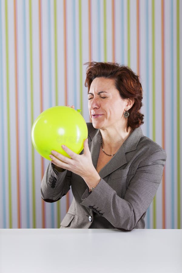 Businesswoman Blowing A Balloon Stock Photo Image of elastic