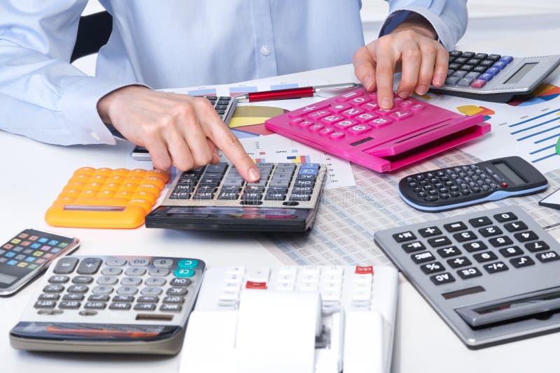 The businesswoman and calculators