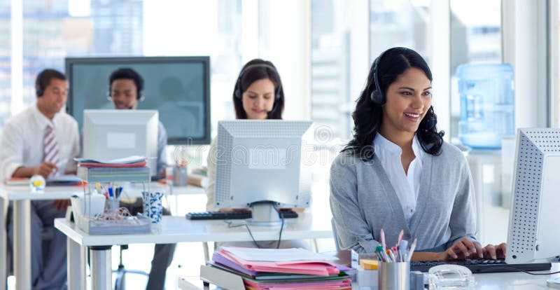 Businesswoman in a call center royalty free stock photo