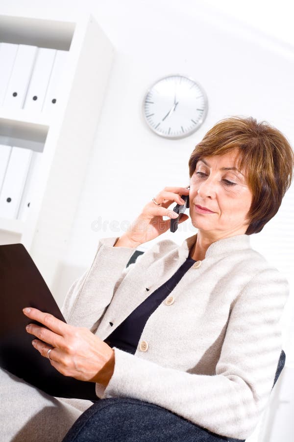 Businesswoman calling on phone