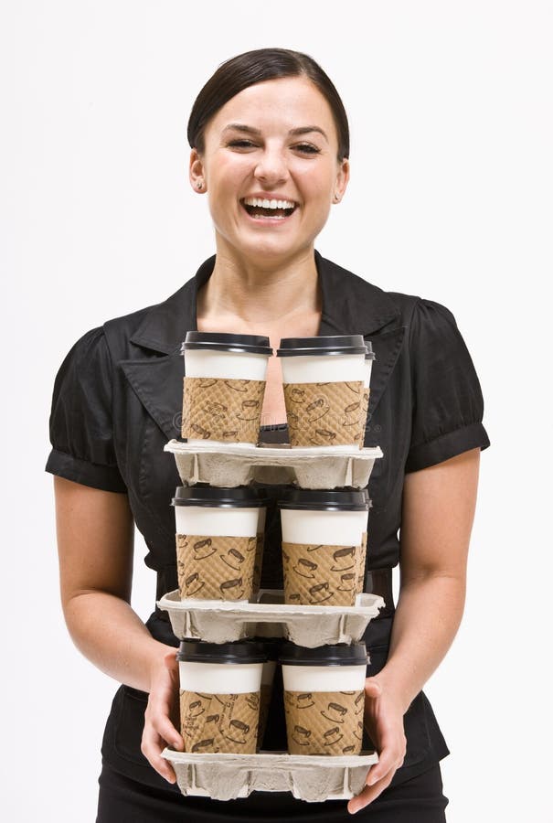 Businesswoman Carrying Stack Of Coffee Cups Stock Photo Image of