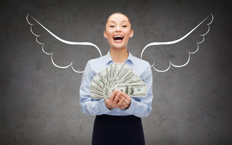 Businesswoman with dollar money and angel wings stock image Businesswoman with dollar money and angel wings stock image