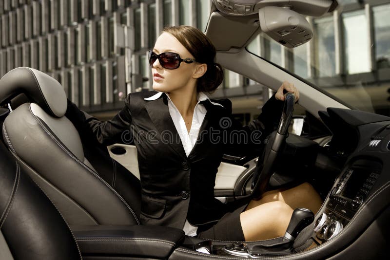 Businesswoman driving a car