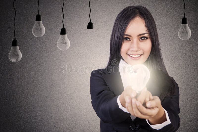 Businesswoman give bright idea