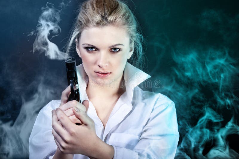 Businesswoman with gun