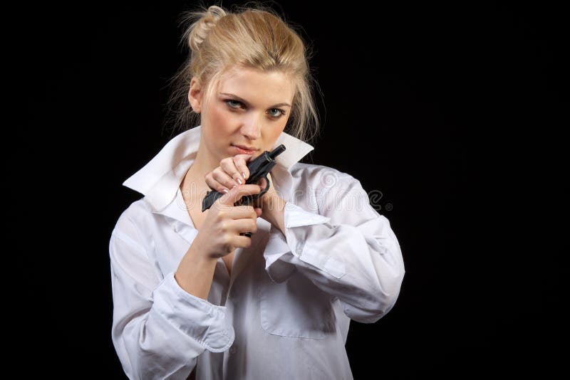 Businesswoman with gun