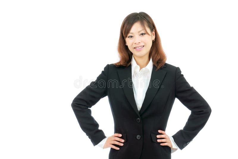 Businesswoman with hands on hips