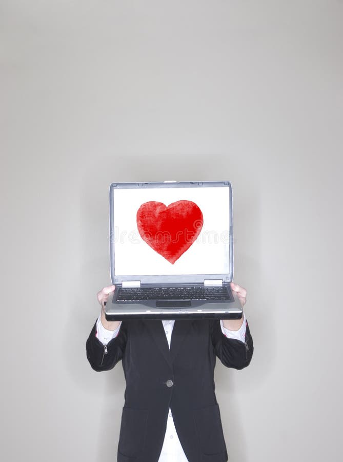 businesswoman heart holding laptop στοκ εικόνες businesswoman heart holding laptop στοκ εικόνες