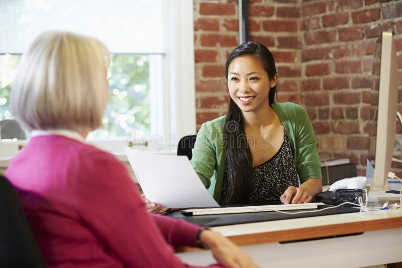 Businesswoman Interviewing Female Job Applicant In Office stock photography Businesswoman Interviewing Female Job Applicant In Office stock photography