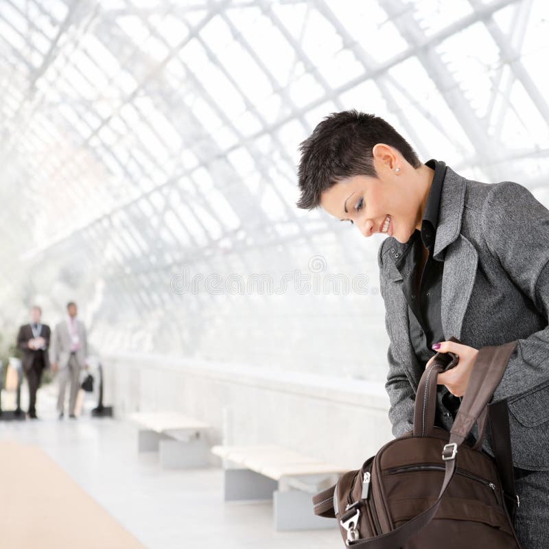 Businesswoman with laptop bag