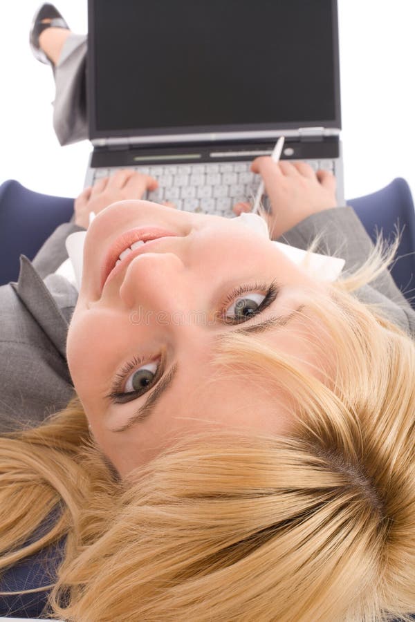 Businesswoman with laptop rest in chair over white