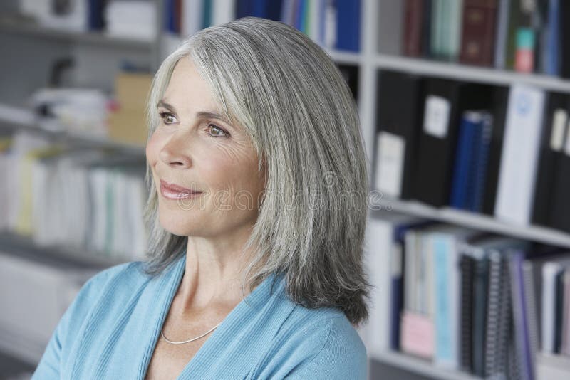 Businesswoman Looking Away In Office