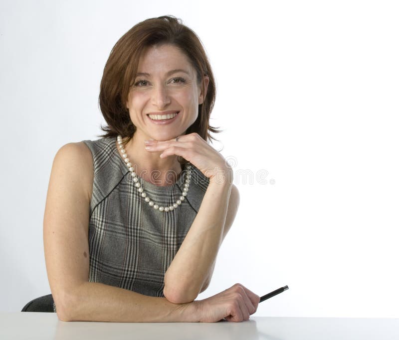 Businesswoman with a pen in hand