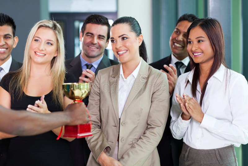 Businesswoman receiving trophy stock images Businesswoman receiving trophy stock images