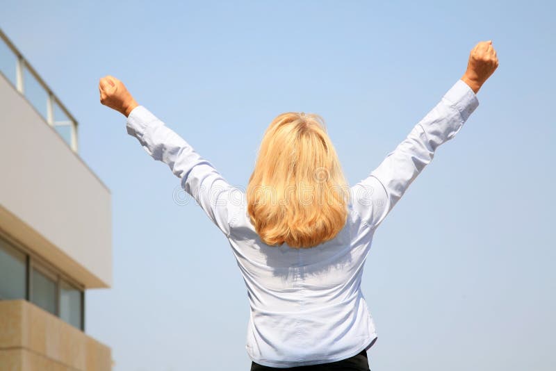 Businesswoman shouting her victory to the world