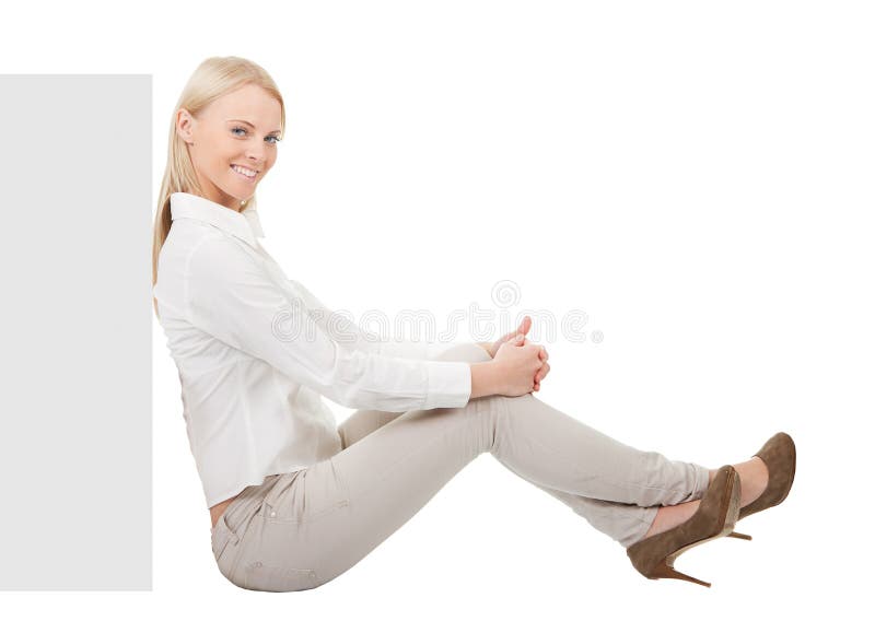 Businesswoman sitting next to copyspace stock image Businesswoman sitting next to copyspace stock image