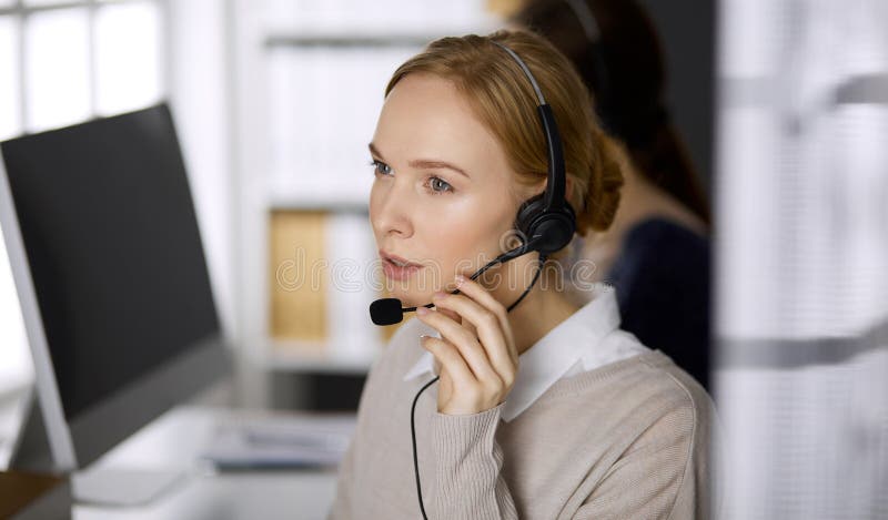 Business People Wearing Headset Celebrate Working Office Call Center  Telemarketing Stock Photo by ©BiancoBlue 665363060