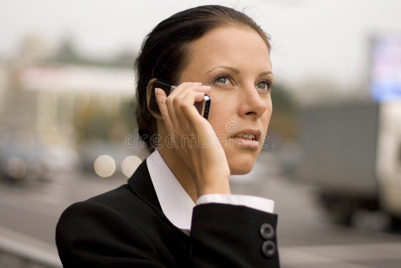 Businesswoman talking by mobile phone