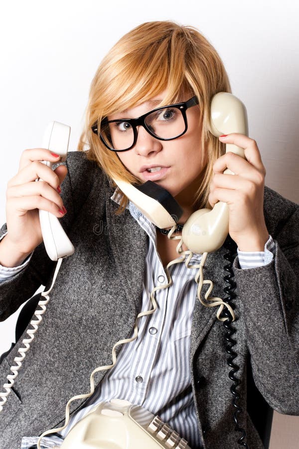 Businesswoman with three phones