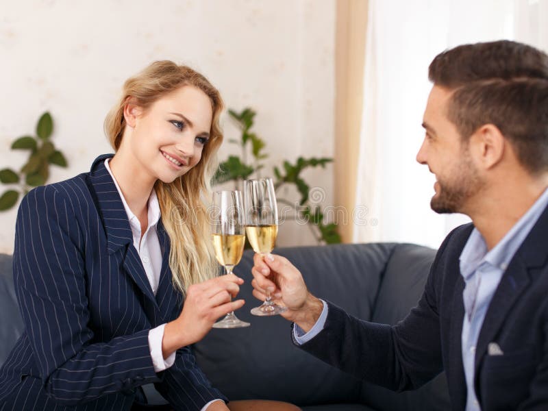 Businesswoman Toast with Businessman in Office Stock Photo - Image of ...