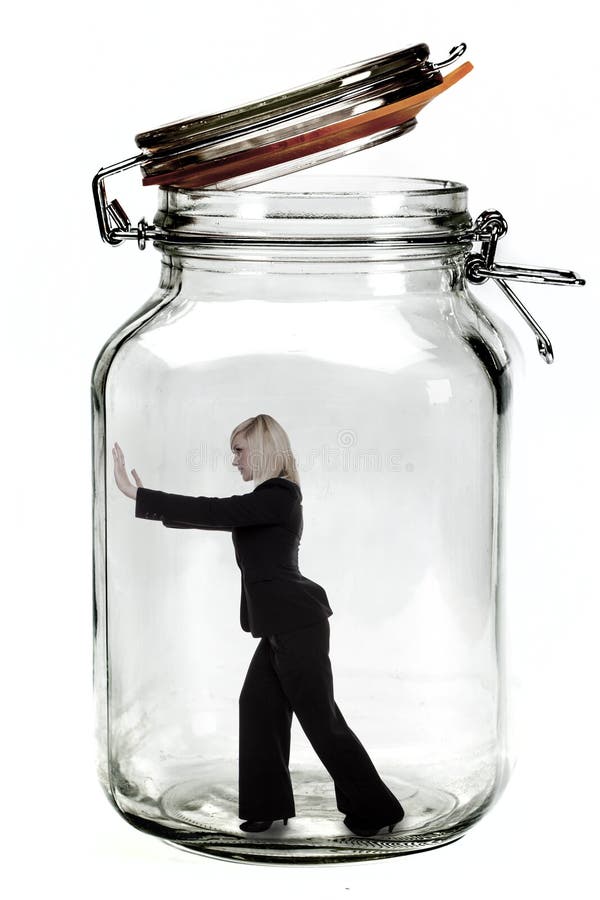 businesswoman-trapped-inside-transparent-glass-jar-34931551.jpg