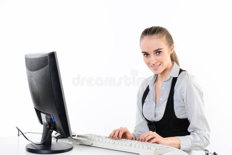 Businesswoman using computer and typing on the keyboard