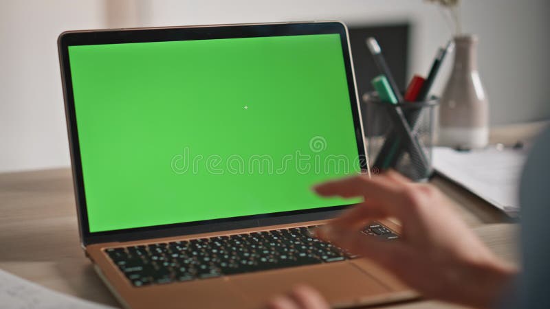 Businesswoman using mockup laptop for remote work at home workplace closeup. stock images