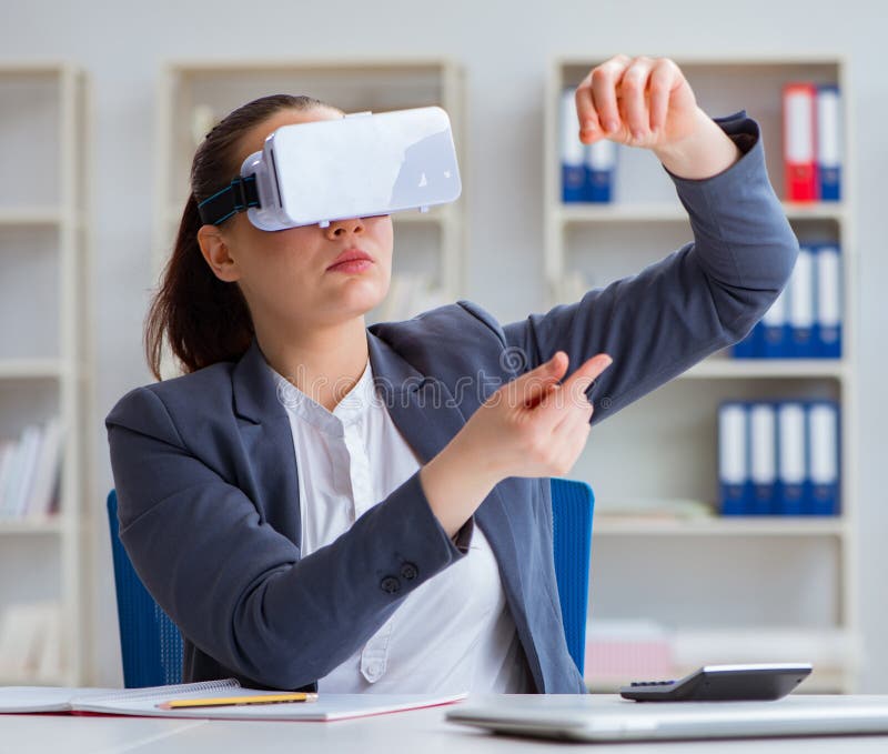Businesswoman With Virtual Reality Glasses In Office Stock Image