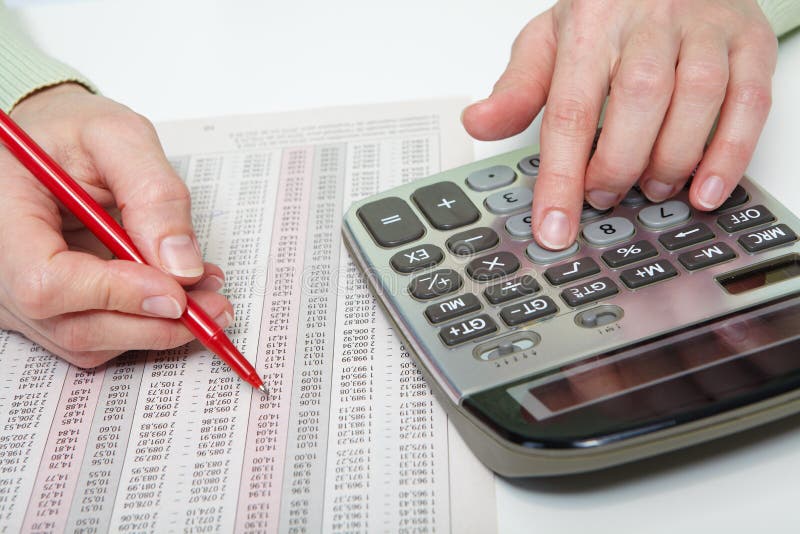 Businesswoman working with calculator