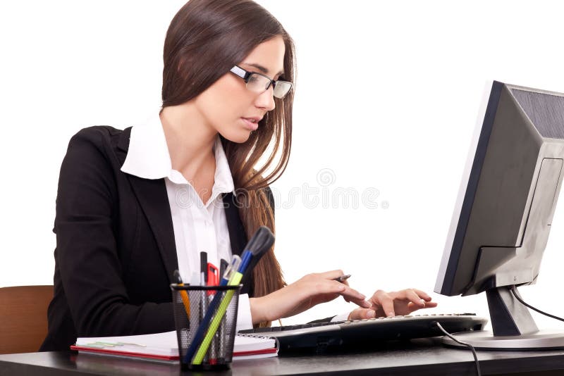 Businesswoman working on computer stock image