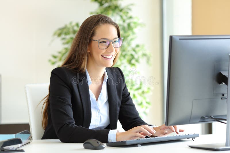 Professional Girl Gamer Plays in MMORPG or Strategy Video Game on Her  Computer. She's Participating in