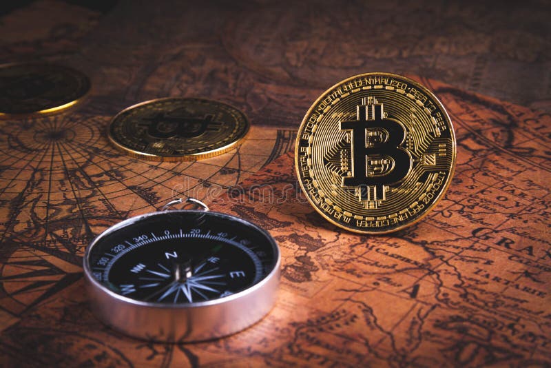 Bussola e bitcoin. viaggiare e critocratiche. acquisto di biglietti con monete in euro. fotografie stock