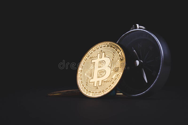 Bussola e bitcoin. viaggiare e critocratiche. acquisto di biglietti con monete in euro. fotografie stock