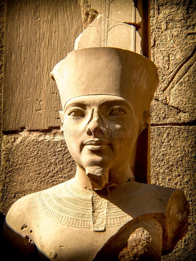 Bust of pharaoh Tutankhamun in Karnak Temple (Luxor, Egypt). Detail of bust of Pharaoh Tutankhamun in one of the precincts of the Temple of Karnak (Luxor, Egypt stock photos