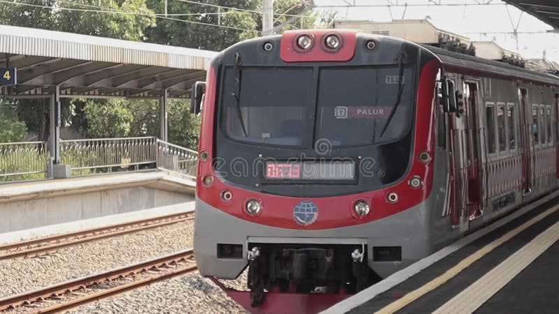 Yogyakarta, Indonesia - October 27, 2024: local train leaving the station stock video footage