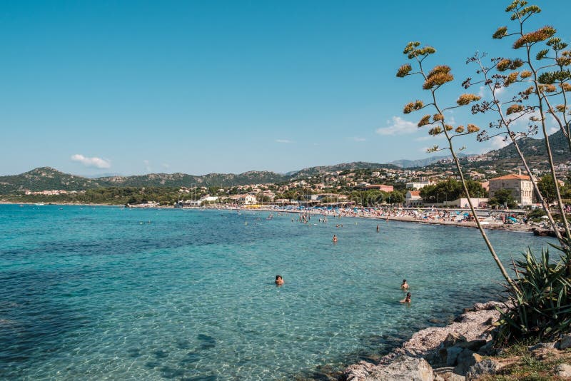 Busy Beach at Ile Rousse in Corsica Editorial Stock Image - Image of ...