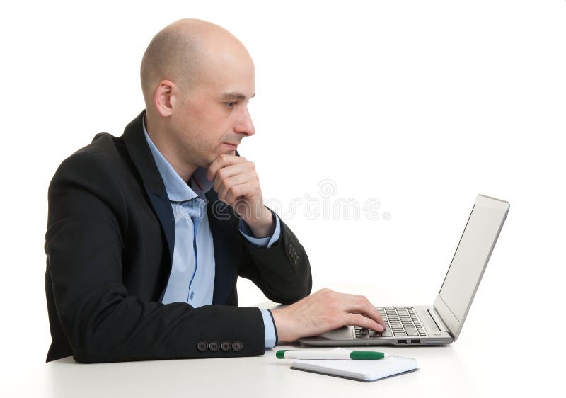 Busy businessman working on his laptop