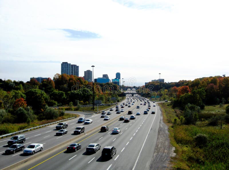 The picturesque Don Valley Parkway in Toronto in the fall. medium car traffic