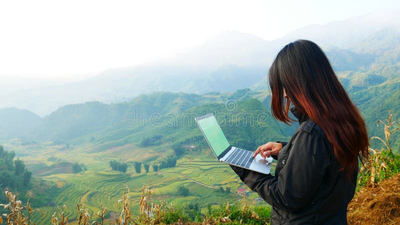 Busy freelance woman laptop outdoor.  Businesswoman corporate city life outside with lifestyle technology. Beautiful woman connect