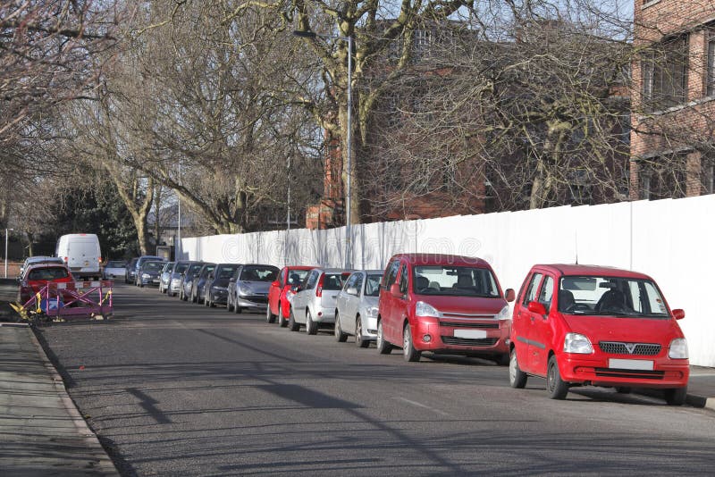 Busy street parked cars