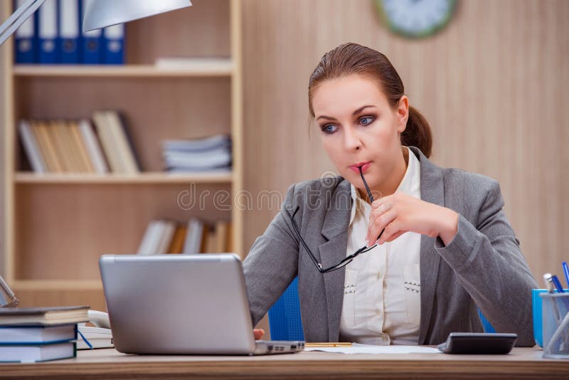 The Busy Stressful Woman Secretary Under Stress In The Office Stock