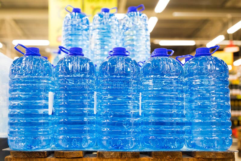 Bottled still water on the palette, closeup view. Bottled still water on the palette, closeup view