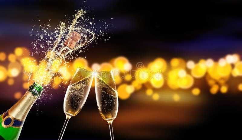 Splashing bottle of champagne with glass over blur colored spot background. Celebration concept, free space for text. Splashing bottle of champagne with glass over blur colored spot background. Celebration concept, free space for text