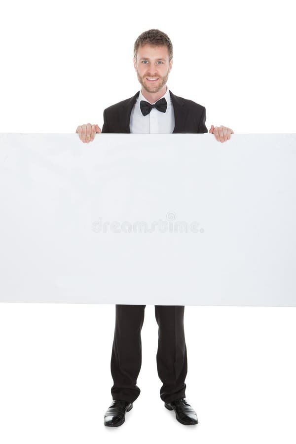 Butler Looking At Blank Billboard royalty free stock photo Butler Looking At Blank Billboard royalty free stock photo