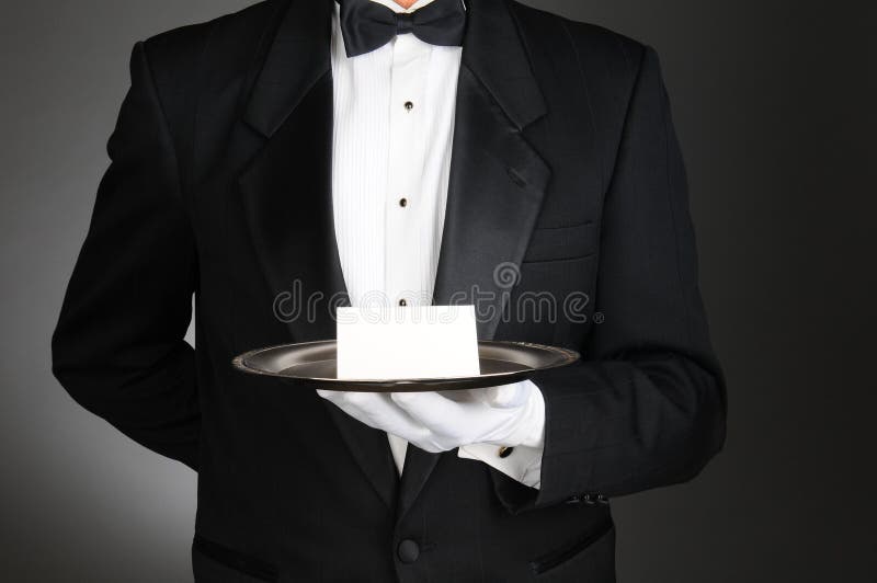 Butler met Nota over Dienblad stock foto Butler met Nota over Dienblad stock foto