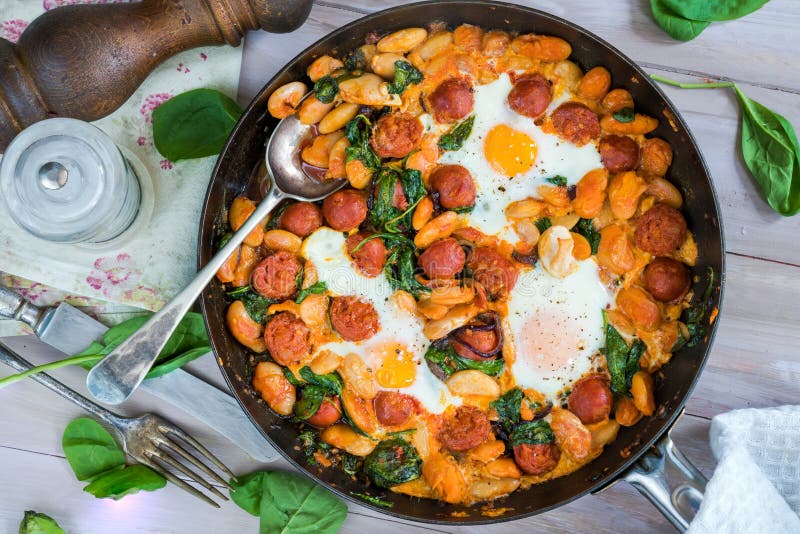 Butter Beans, Chorizo and Spinach Baked Eggs Stock Image Image of