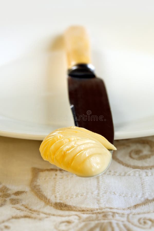 Butter on Butter Knife stock photo. Image of yellow, spread 10598380